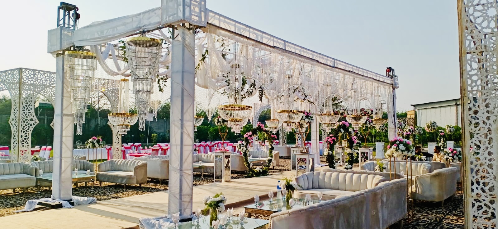 Event planning team arranging floral centerpieces