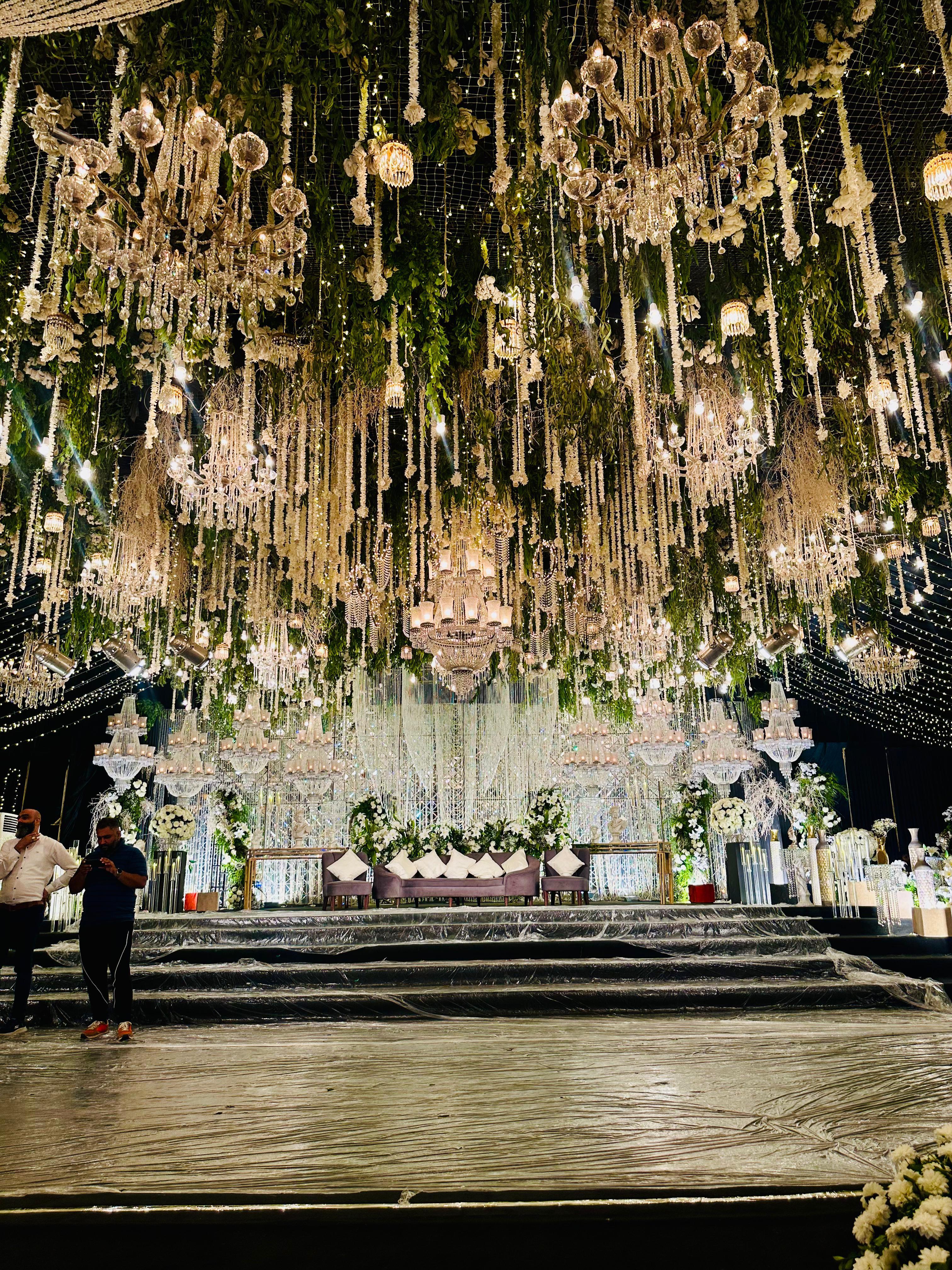 Wedding stage with floral canopy