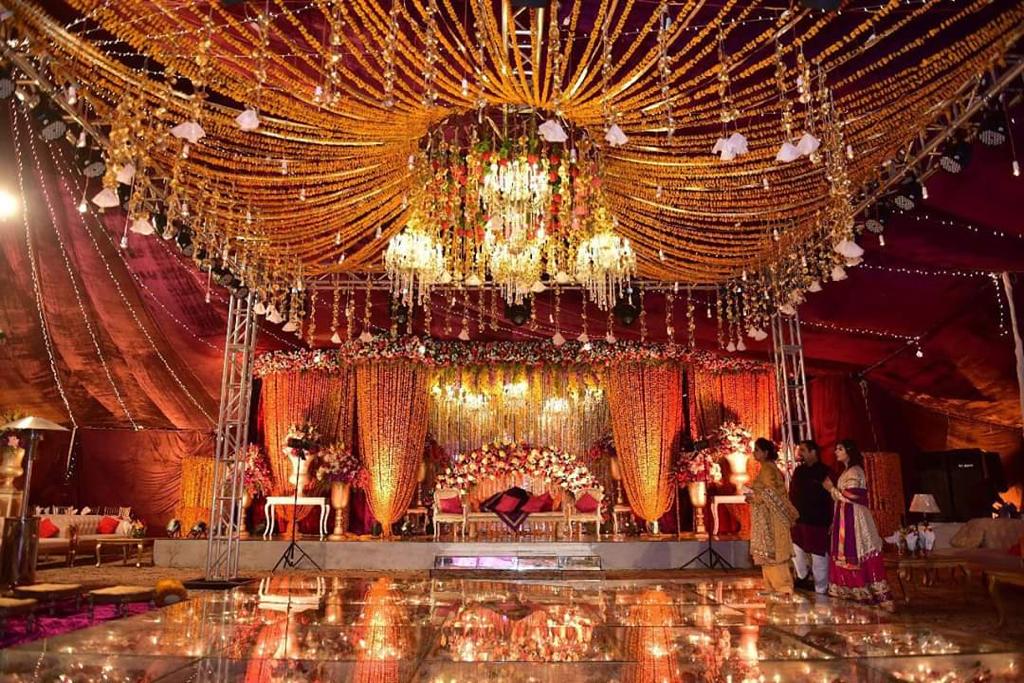 Luxury wedding stage decor with floral arrangements